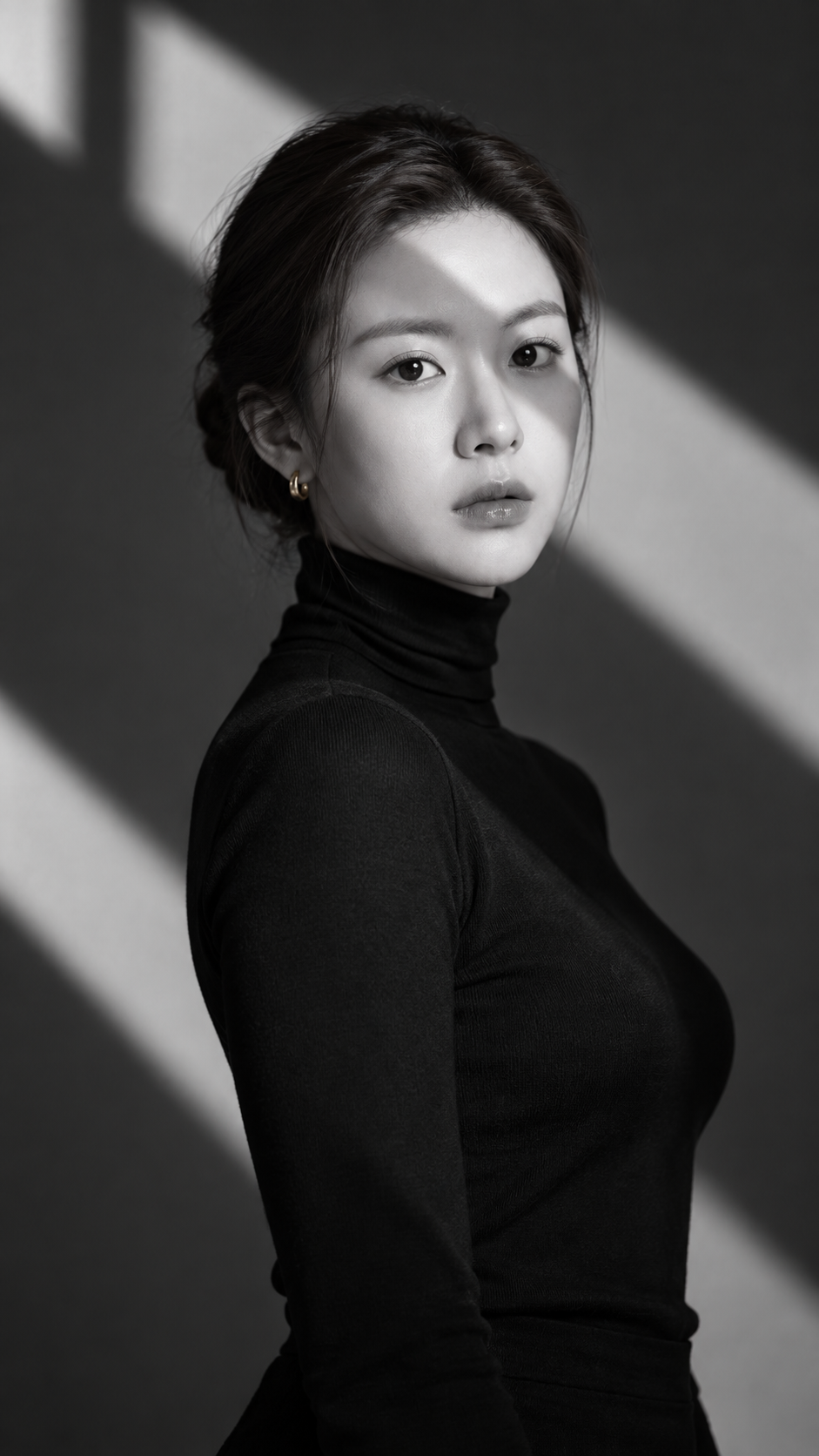 Cool Beauty in Black and White Turtleneck Under Geometric Light and Shadow